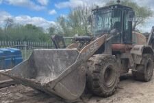 Plant fitter struck by loading bucket