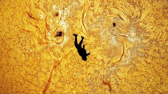 ‘It was an incredible moment.’ Skydiver plunges across the face of the sun jaw-dropping astrophotographer photo